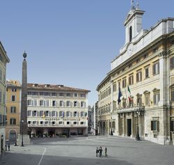 a large building in the middle of the street