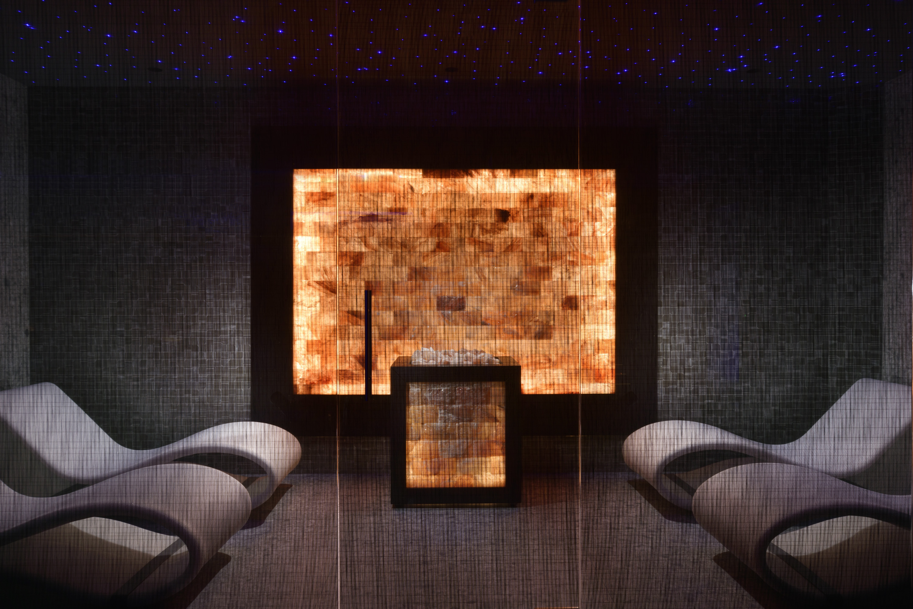 a close up of a fire place sitting in a room
