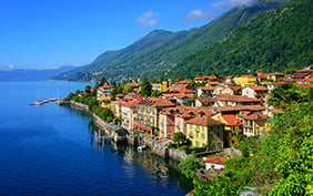 Historical tourist resort town Cannero Riviera on Lago Maggiore lake, Alps mountains, Italy