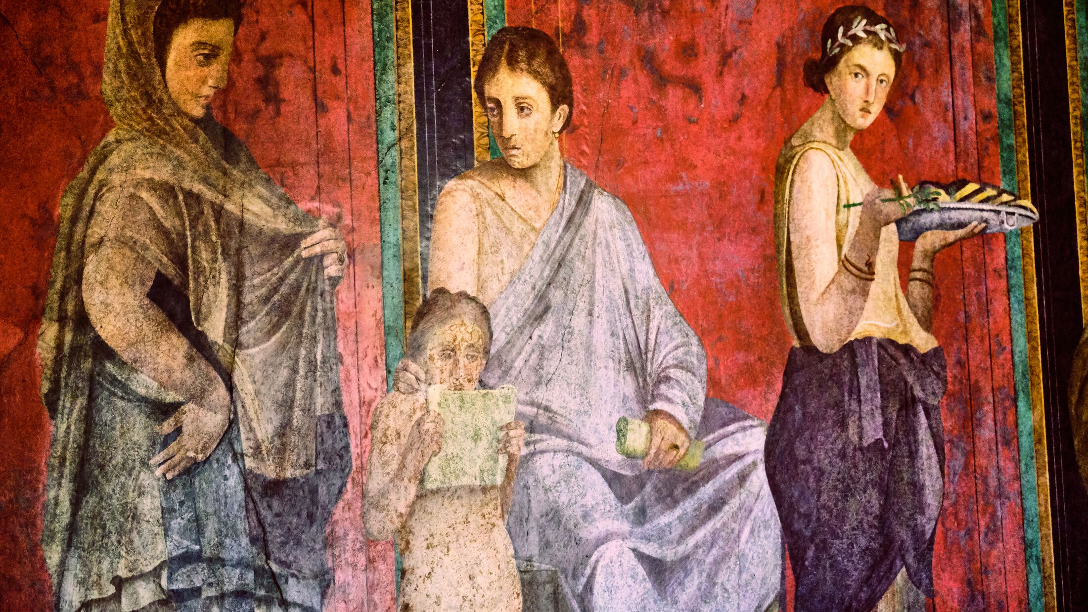detail of the ancient painting in the Villa of the Mysteries in Pompeii.